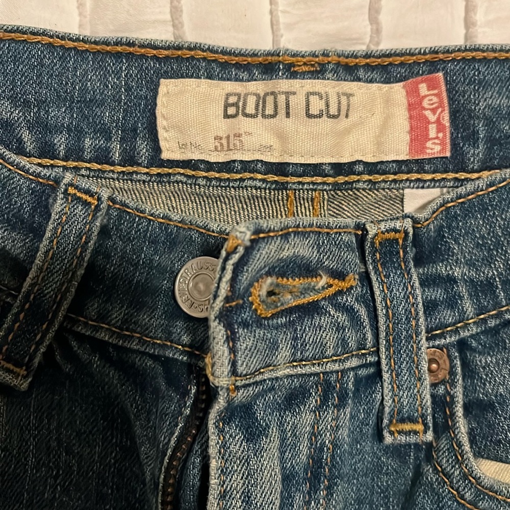 Levi’s boot cut low waisted jeans. Dark wash.
